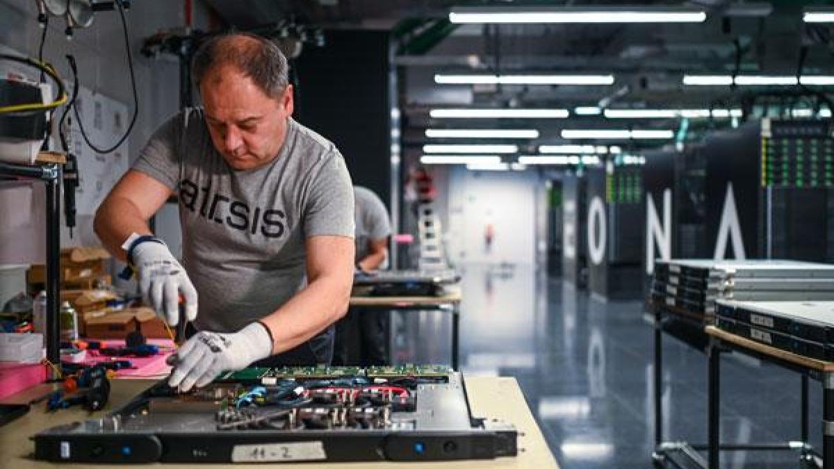 an-it-specialist-working-at-the-leonardo-supercomputer-facility_13968300