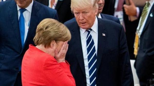 Întâlnire neprogramată Merkel-Trump la summitul NATO, pe fondul ultimelor declaraţii la adresa Germaniei