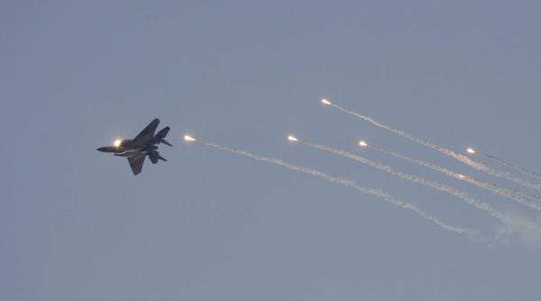 Avioane de vânătoare neidentificate au bombardat un depozit militar iranian din Siria