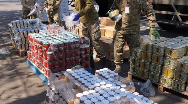 Militari ai Batalionului 1 CIMIC au distribuit pachete cu produse alimentare pentru veteranii de război