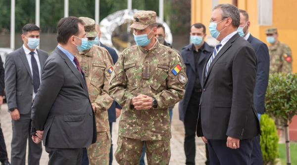 Premierul Ludovic Orban și ministrul Nicolae Ciucă, la Centrul de Excelență NATO în domeniul HUMINT