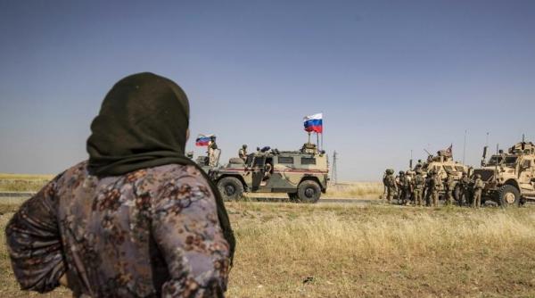 Siria: Convoi de blindate ale US Army, încercuit de mai multe vehicule şi elicoptere ruseşti (Foto/Video)