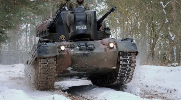 Militarii români din Polonia, exerciţiu de antrenament la -24 de grade celsius 