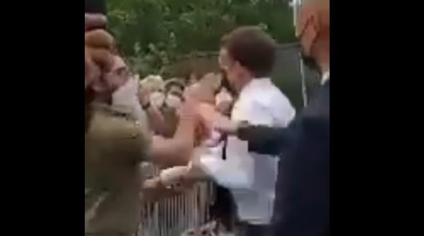 Incident de securitate în Franța. Macron a primit o palmă în timp ce saluta mulțimea (VIDEO)