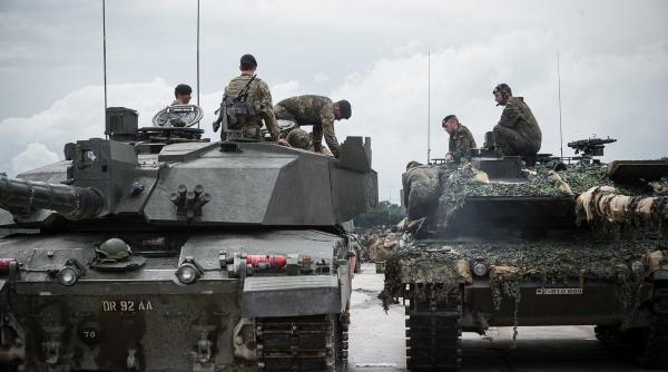 Consolidarea pilonului european al NATO se face cu implicarea Marii Britanii şi a Germaniei: Europa trebuie să-și asume responsabilitatea pentru propria sa securitate