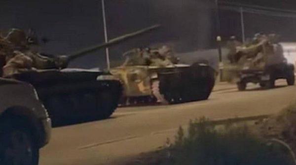 Mii de soldați sirieni au fugit în Irak unde și-au predat armele și au cerut azil