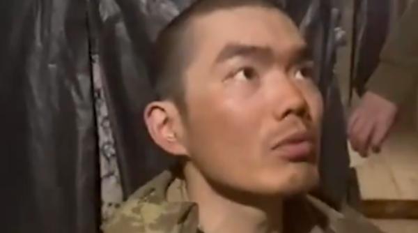 Volodimir Zelenski publică imagini cu militari chinezi capturați în uniforme rusești