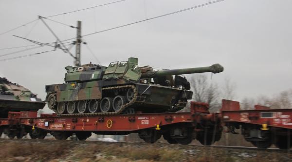 Veriga slabă a NATO? România plătește milioane de euro către CFR Marfă pentru transport militar pe linii învechite